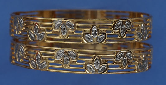 Maple leaf slip on bangle bracelets in white and yellow gold