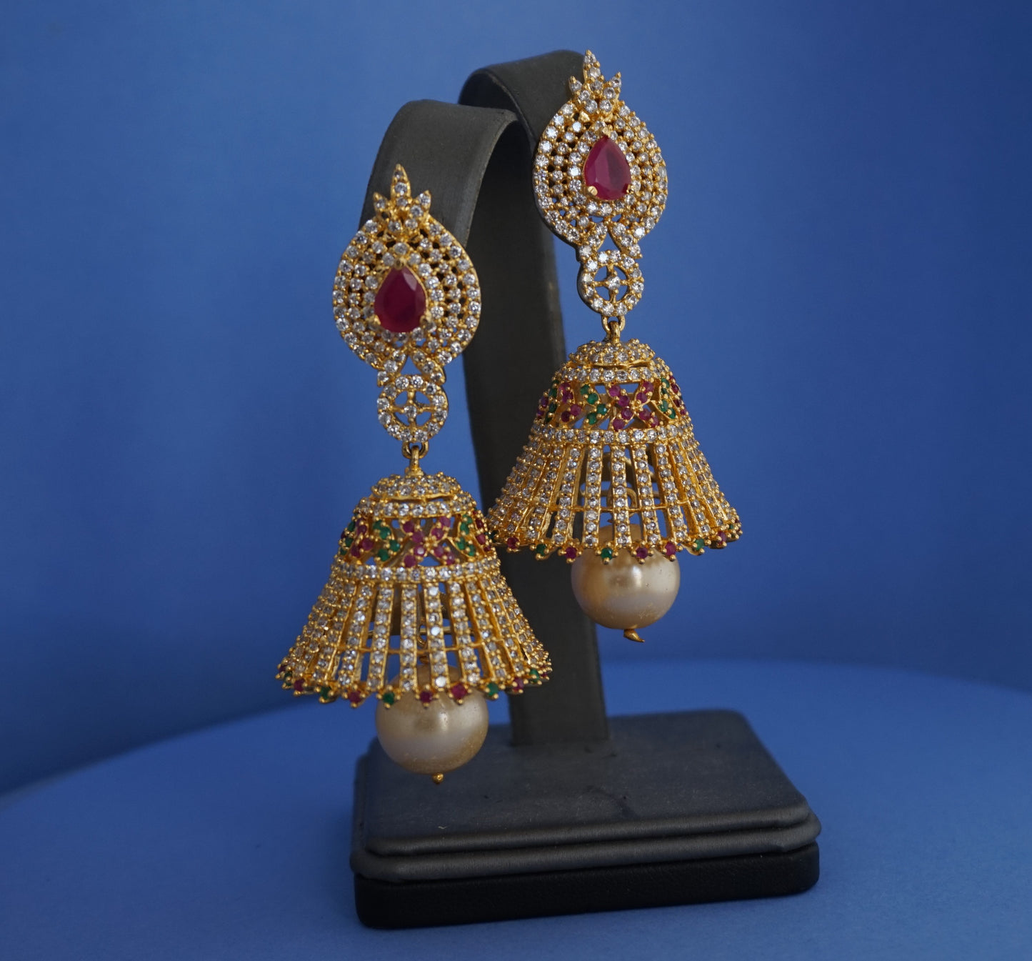 Bell earrings studded with cubic zirconia and pearls