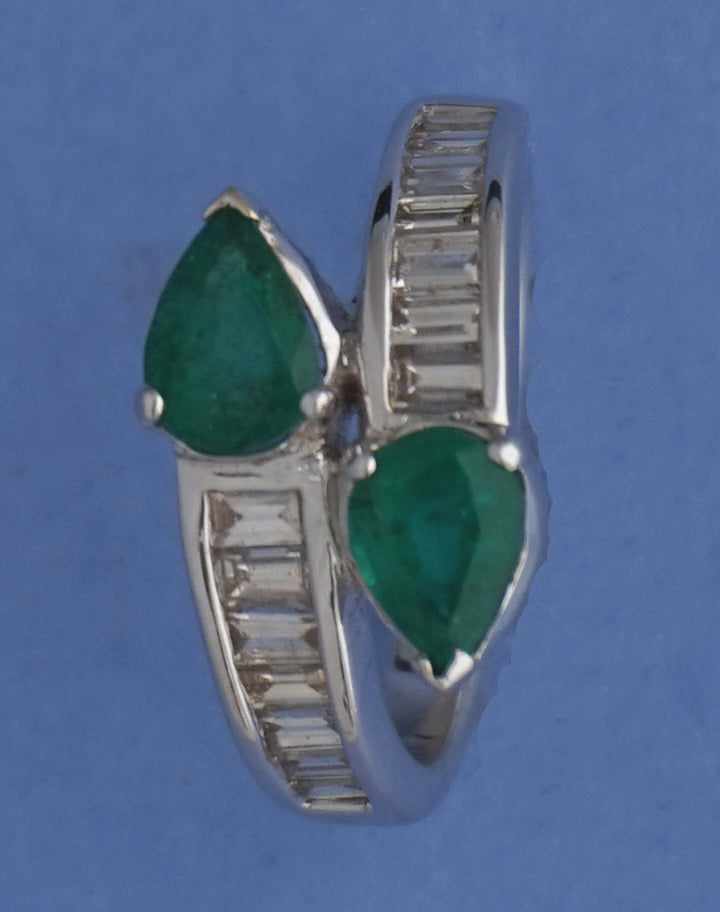 18k White Gold overlapping Ring studded with Diamonds & Emeralds