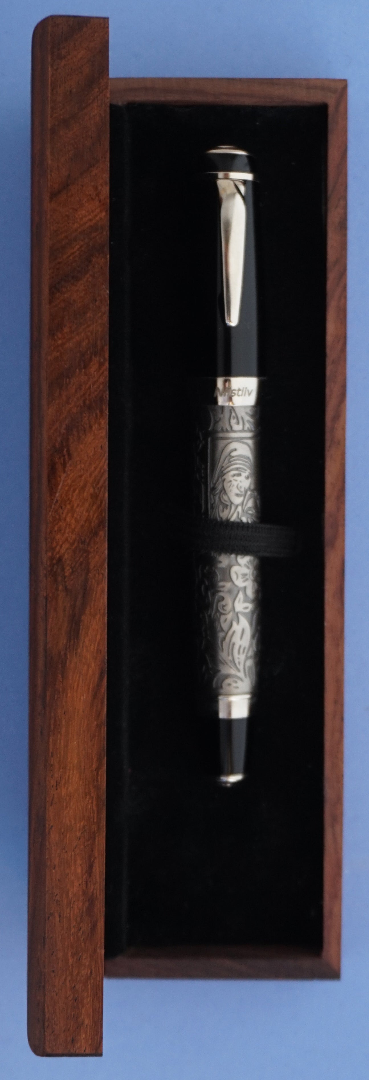 Fountain pen engraved with flower design sketch of Mother Teresa