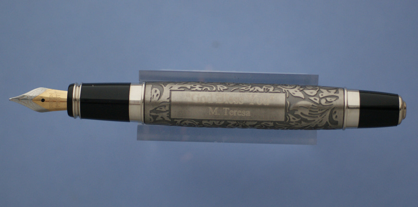 Fountain pen engraved with flower design sketch of Mother Teresa