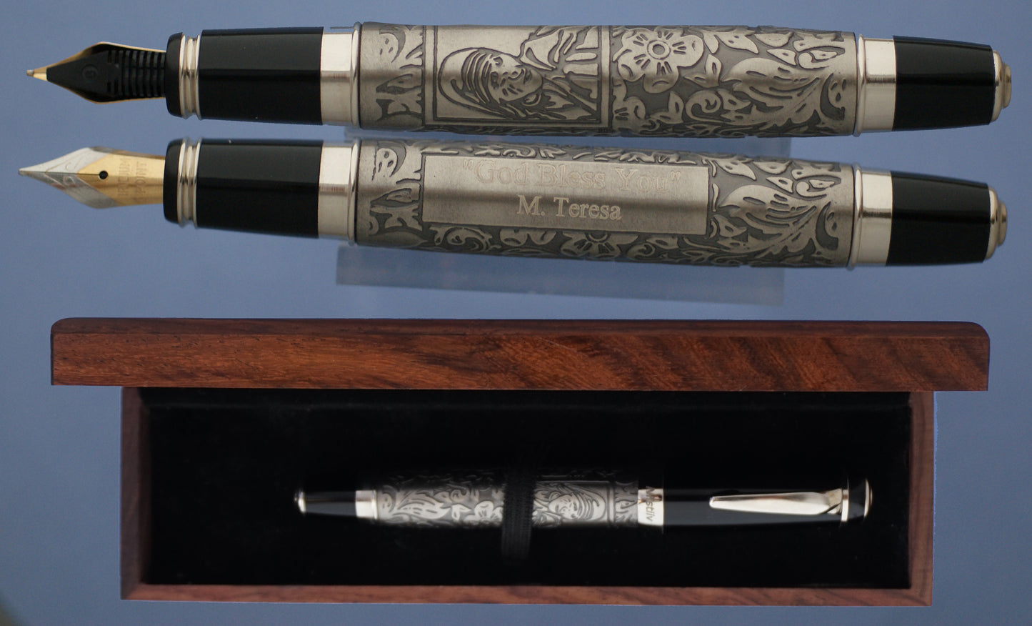 Fountain pen engraved with flower design sketch of Mother Teresa